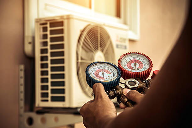 Professional Ac Installation technician working in Old Orchard Beach, ME
